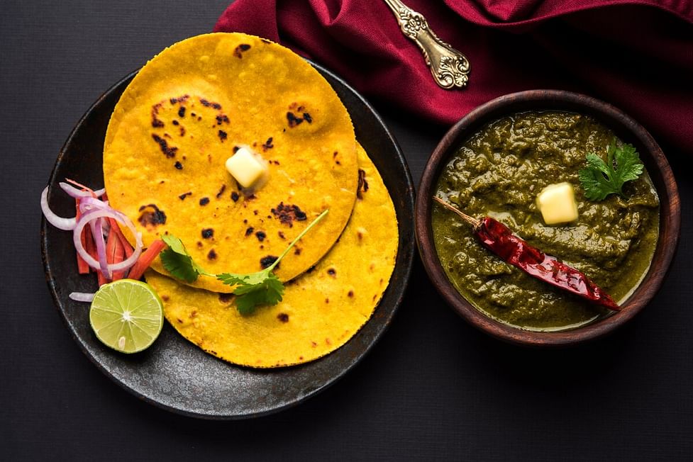 Top 10 Best Traditional Foods in India 2 Sarson ka Saag aur Makki ki Roti Recipe resized.jpg?w=376&dpr=2